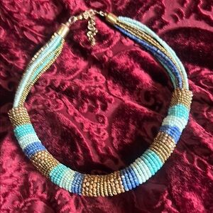 Elegant Beaded Necklace in Gold and Blue